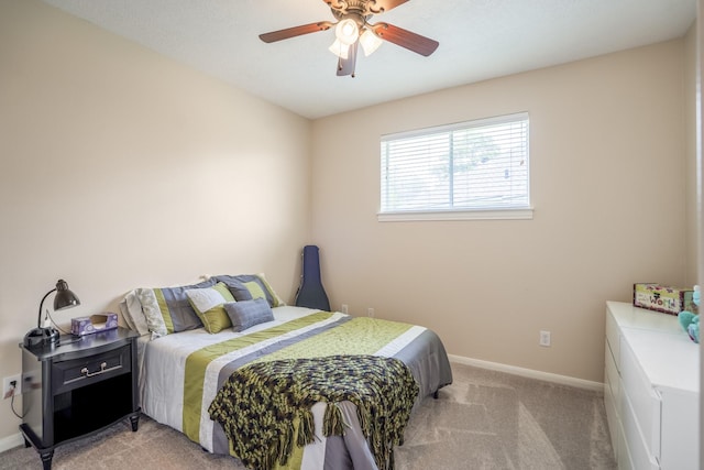 13685 Lakeside Place Dr, Willis, TX 77318 - bedroom featuring light carpet and a ceiling fan