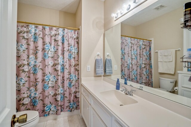 13685 Lakeside Place Dr, Willis, TX 77318 - full bathroom with vanity, a shower with curtain, and tile patterned floors