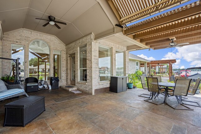 13685 Lakeside Place Dr, Willis, TX 77318 - view of patio with a ceiling fan, a pergola, and outdoor dining area