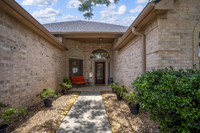 13685 Lakeside Place Dr, Willis, TX 77318 - entrance to property with brick siding and roof with shingles