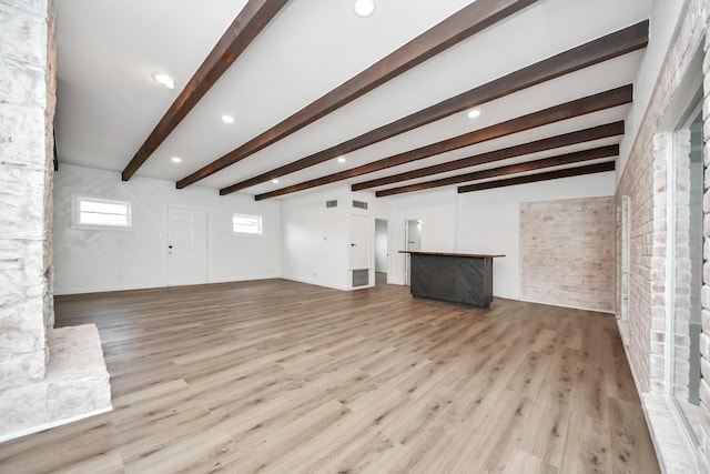722 Merrick Dr, Sugar Land, TX 77478 - unfurnished living room featuring beam ceiling, wood finished floors, recessed lighting, and baseboards