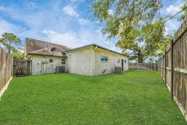 722 Merrick Dr, Sugar Land, TX 77478 - rear view of property featuring brick siding and cooling unit