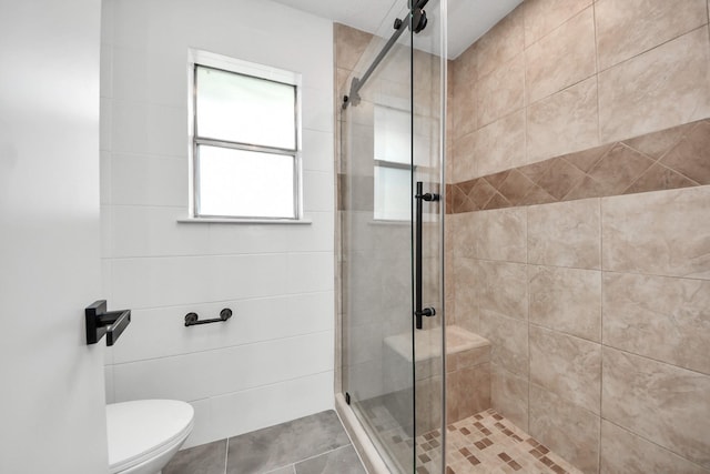 722 Merrick Dr, Sugar Land, TX 77478 - bathroom featuring a stall shower and toilet