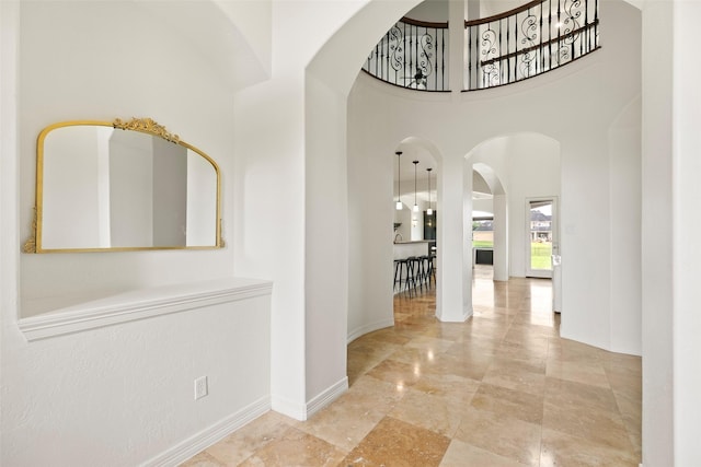 8410 Den Oak Dr, Richmond, TX 77406 - corridor with arched walkways and a high ceiling