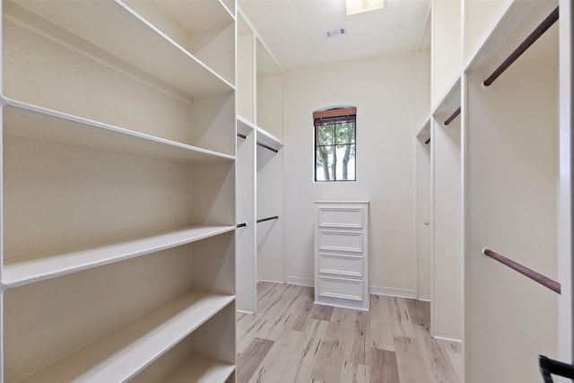 8410 Den Oak Dr, Richmond, TX 77406 - walk in closet with light wood finished floors