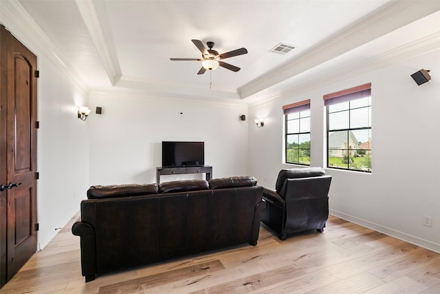 8410 Den Oak Dr, Richmond, TX 77406 - living room with ceiling fan, a raised ceiling, light wood-style floors, and ornamental molding