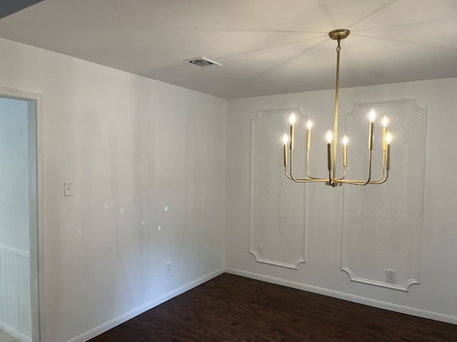 3714 Woodbriar Dr, Houston, TX 77068 - spare room with a chandelier, dark wood-style floors, and baseboards