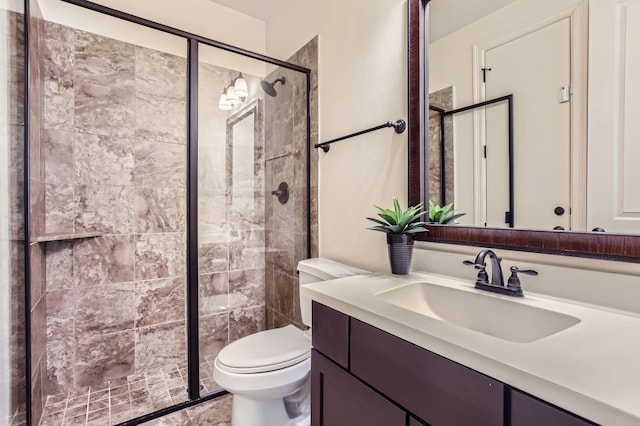 6 Freestone Stream Pl, Spring, TX 77389 - full bathroom featuring a shower stall, vanity, and toilet