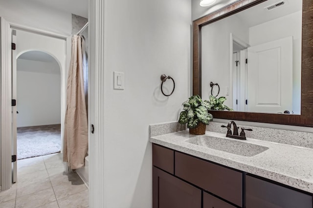 6 Freestone Stream Pl, Spring, TX 77389 - full bathroom featuring vanity and tile patterned floors