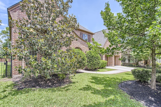 6 Freestone Stream Pl, Spring, TX 77389 - view of front facade with brick siding