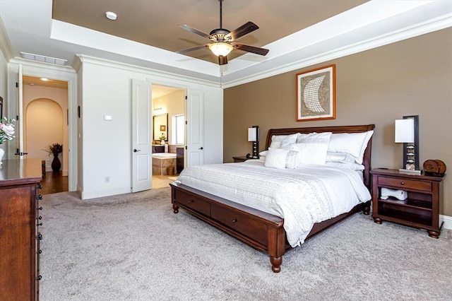 6 Freestone Stream Pl, Spring, TX 77389 - bedroom with a tray ceiling, carpet, baseboards, and a ceiling fan