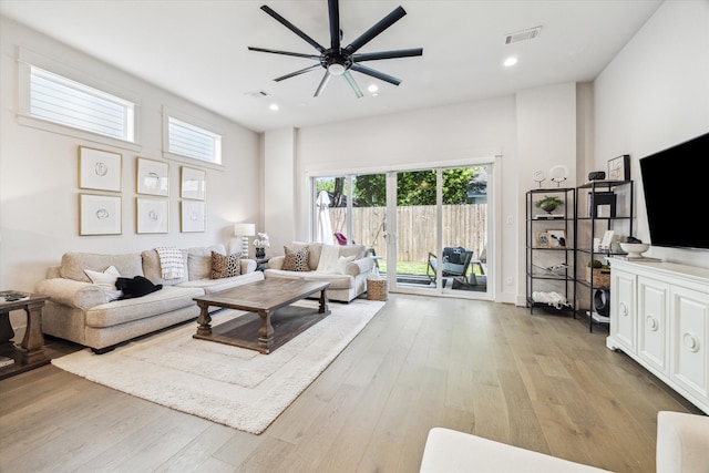 1026 Adele St, Houston, TX 77009 - living room featuring light wood finished floors, ceiling fan, and recessed lighting