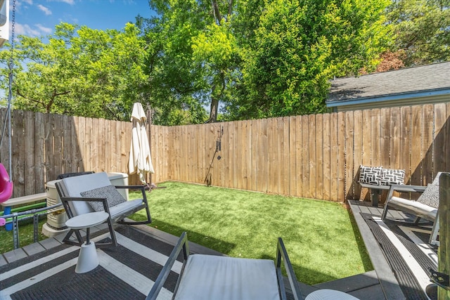 1026 Adele St, Houston, TX 77009 - view of yard with a patio