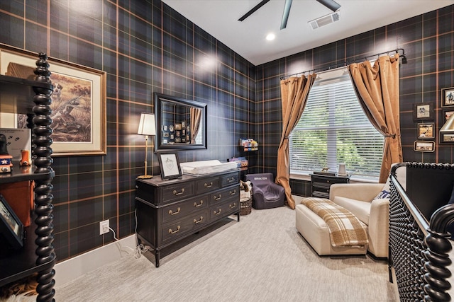 1026 Adele St, Houston, TX 77009 - sitting room featuring ceiling fan and carpet floors