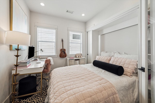 1026 Adele St, Houston, TX 77009 - bedroom with recessed lighting and an office area