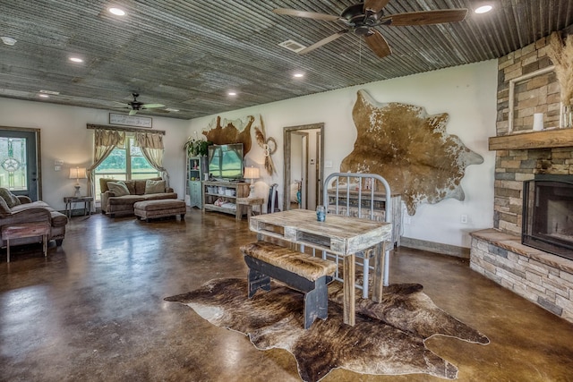 1850 Lcr 439, Groesbeck, TX 76667 - dining area featuring a ceiling fan, finished concrete floors, a fireplace, and recessed lighting