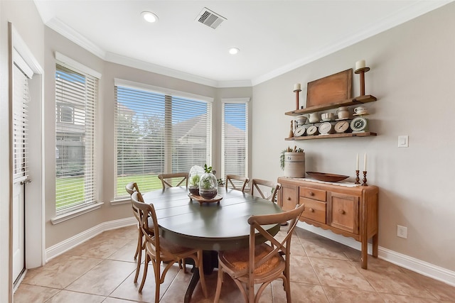 2610 Cedar Path Ln, Conroe, TX 77385 - dining room with crown molding, plenty of natural light, light tile patterned floors, baseboards, and recessed lighting