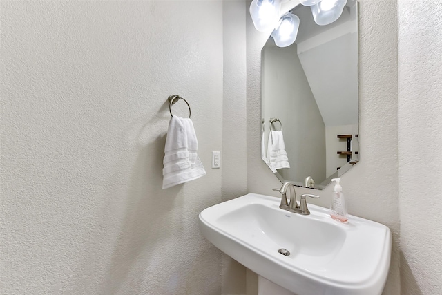 2610 Cedar Path Ln, Conroe, TX 77385 - bathroom with a sink and a textured wall