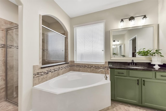 2610 Cedar Path Ln, Conroe, TX 77385 - bathroom with a garden tub, vanity, and a shower stall