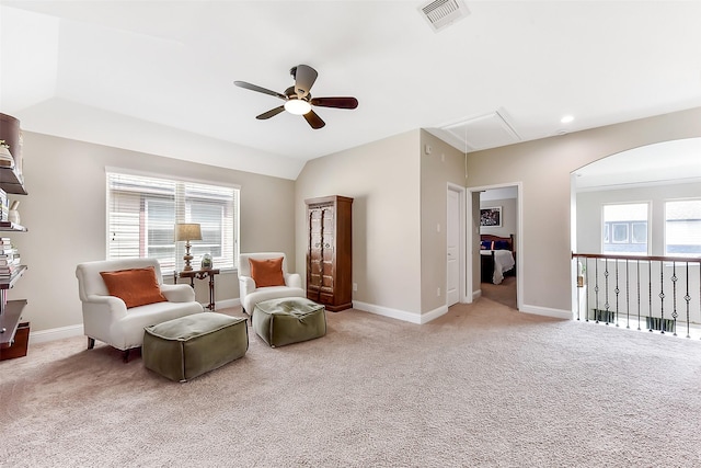 2610 Cedar Path Ln, Conroe, TX 77385 - living area with attic access, a ceiling fan, light carpet, and healthy amount of natural light