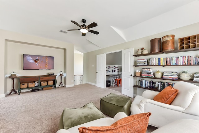2610 Cedar Path Ln, Conroe, TX 77385 - living room featuring carpet floors, ceiling fan, baseboards, and vaulted ceiling