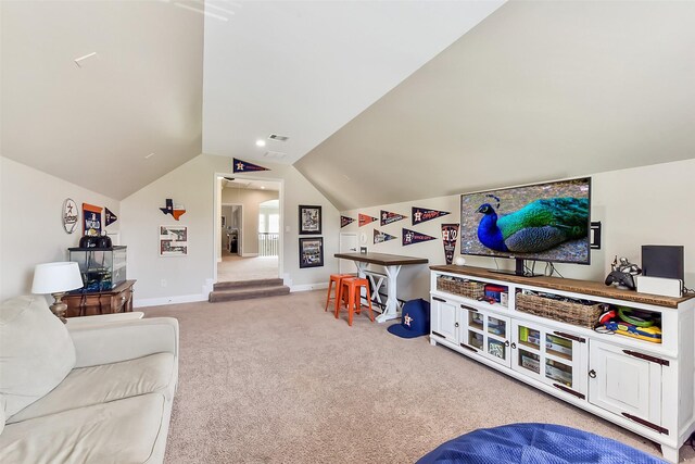 2610 Cedar Path Ln, Conroe, TX 77385 - living area with carpet flooring, lofted ceiling, and baseboards
