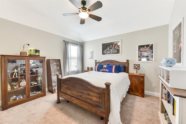 2610 Cedar Path Ln, Conroe, TX 77385 - bedroom with light carpet, ceiling fan, baseboards, and lofted ceiling