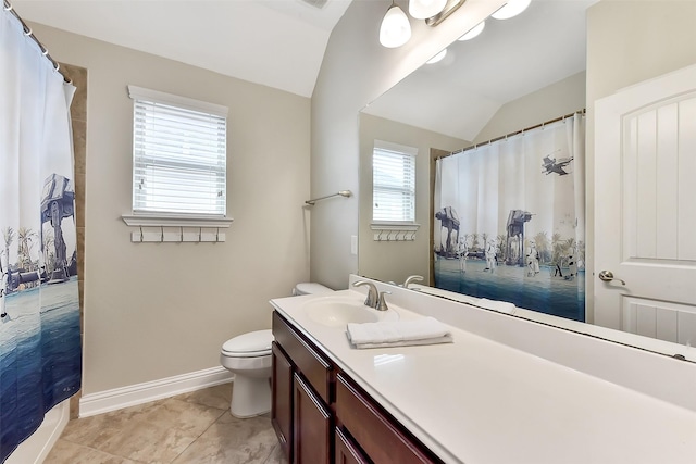 2610 Cedar Path Ln, Conroe, TX 77385 - full bathroom with toilet, vanity, lofted ceiling, and baseboards