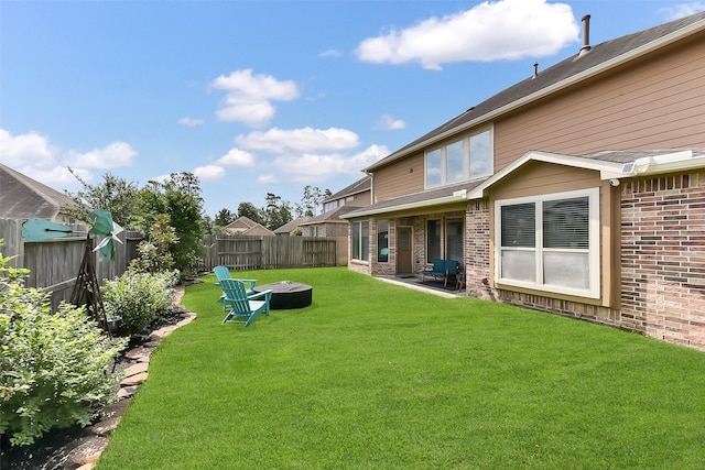 2610 Cedar Path Ln, Conroe, TX 77385 - view of yard with an outdoor fire pit