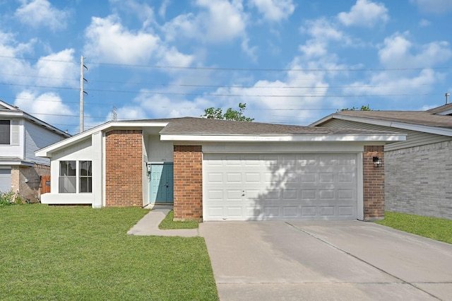 9911 Berry Limb Dr, Houston, TX 77099 - view of front of home with brick siding, concrete driveway, a front lawn, and a garage