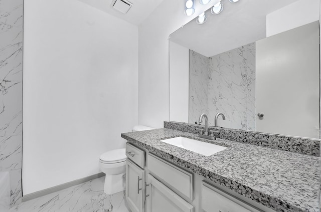 9911 Berry Limb Dr, Houston, TX 77099 - bathroom featuring marble finish flooring, vanity, toilet, and baseboards