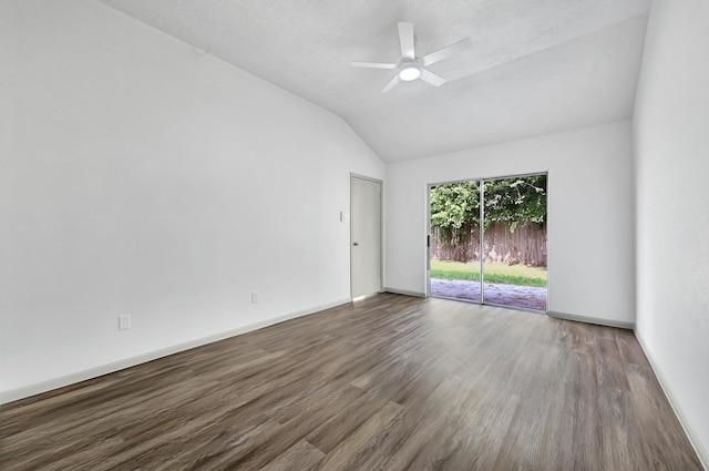 9911 Berry Limb Dr, Houston, TX 77099 - spare room featuring vaulted ceiling, wood finished floors, a ceiling fan, and baseboards