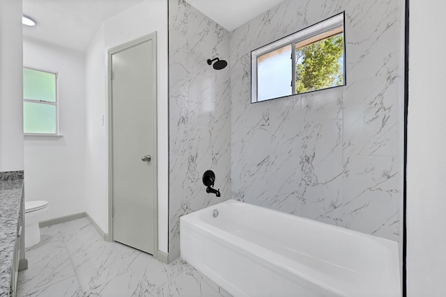 9911 Berry Limb Dr, Houston, TX 77099 - bathroom featuring marble look tiles, toilet, tub / shower combination, and baseboards