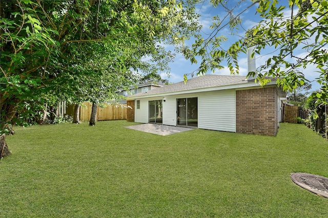 9911 Berry Limb Dr, Houston, TX 77099 - rear view of house featuring a patio area and brick siding