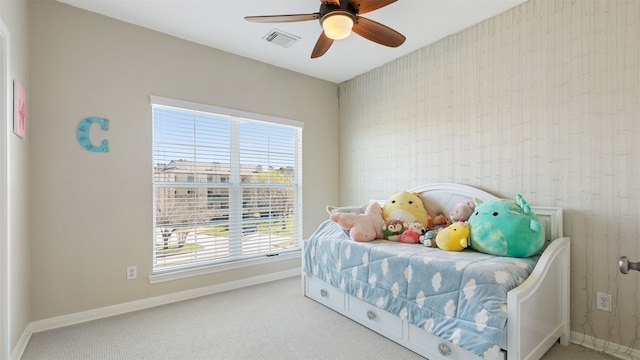 18725 Egret Oaks Ln, Webster, TX 77058 - bedroom with baseboards, carpet floors, and ceiling fan