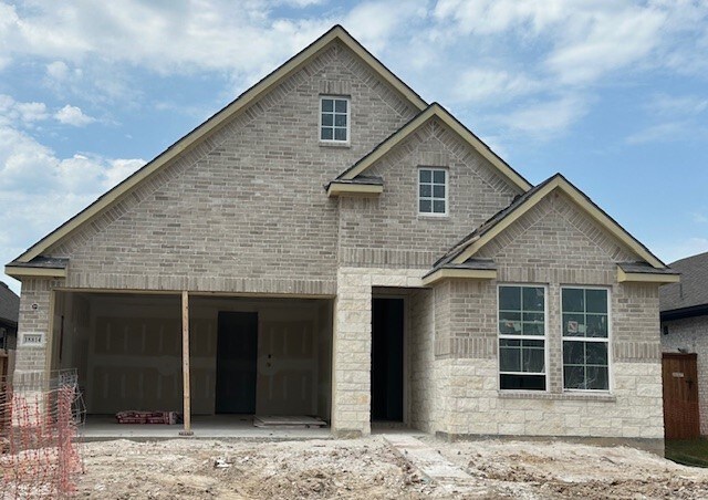 18814 Sweetwater Springs Ln, Cypress, TX 77433 - view of front of property with an attached garage and brick siding