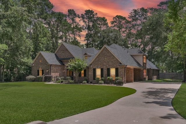 13273 Royal Rdg, Conroe, TX 77302 - view of front of property with brick siding, concrete driveway, and a shingled roof