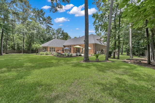 13273 Royal Rdg, Conroe, TX 77302 - rear view of property with brick siding