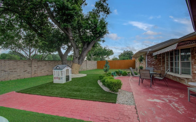 15014 Carol Chase Cir, Houston, TX 77489 - view of yard featuring a patio