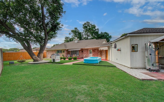 15014 Carol Chase Cir, Houston, TX 77489 - rear view of house with roof with shingles