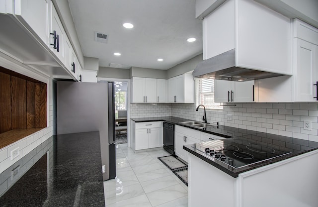 15014 Carol Chase Cir, Houston, TX 77489 - kitchen featuring a sink, black appliances, plenty of natural light, light marble finish flooring, and recessed lighting