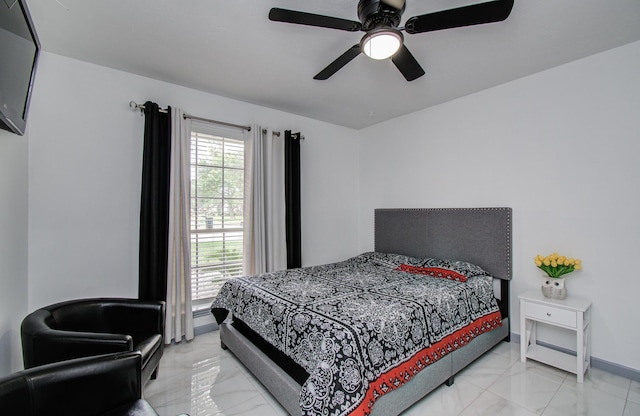 15014 Carol Chase Cir, Houston, TX 77489 - bedroom with light marble finish flooring and a ceiling fan