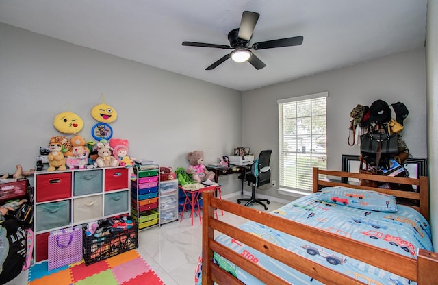 15014 Carol Chase Cir, Houston, TX 77489 - bedroom featuring ceiling fan, marble look tile flooring, and baseboards