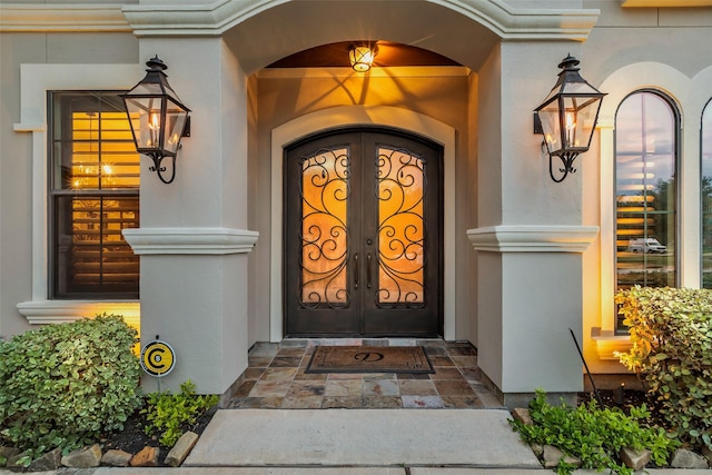 5306 Lockwood Bend Ln, Sugar Land, TX 77479 - doorway to property with french doors and stucco siding