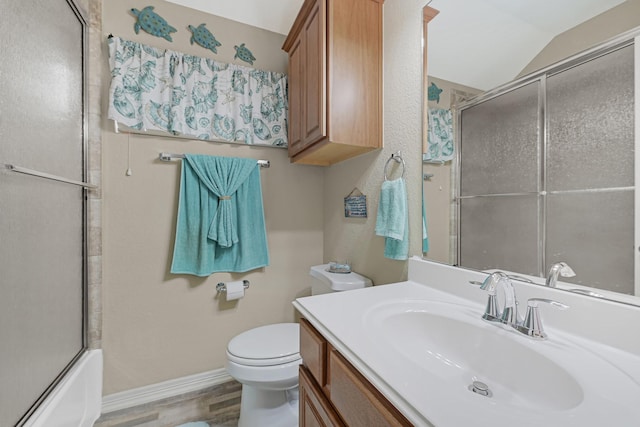 3518 Bain St, Houston, TX 77026 - bathroom featuring toilet, vanity, baseboards, wood finished floors, and lofted ceiling
