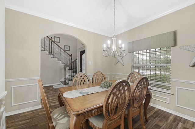 3518 Bain St, Houston, TX 77026 - dining area with dark wood-style floors, a chandelier, arched walkways, stairs, and crown molding