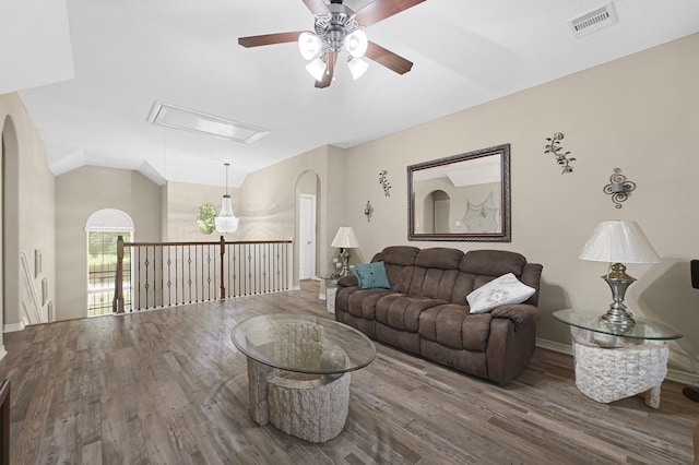 3518 Bain St, Houston, TX 77026 - living room featuring attic access, a ceiling fan, wood finished floors, lofted ceiling, and baseboards