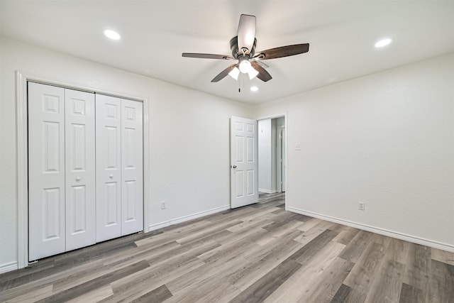 6315 Amie Ln Unit Cr879, Pearland, TX 77584 - unfurnished bedroom with light wood-type flooring, recessed lighting, a closet, baseboards, and a ceiling fan