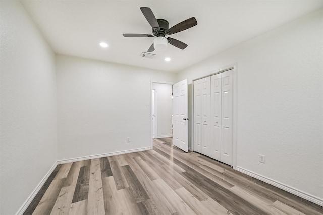 6315 Amie Ln Unit Cr879, Pearland, TX 77584 - unfurnished bedroom featuring light wood-style flooring, recessed lighting, baseboards, a closet, and ceiling fan