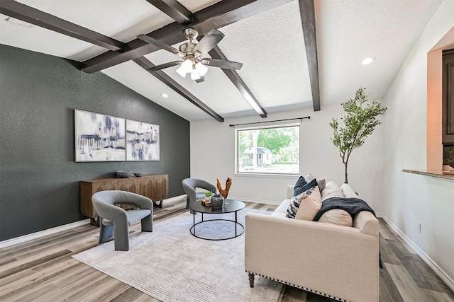 6315 Amie Ln Unit Cr879, Pearland, TX 77584 - living area featuring wood finished floors, ceiling fan, baseboards, recessed lighting, and a textured ceiling